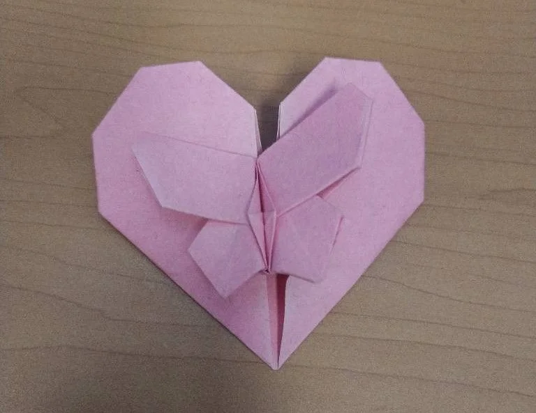  A heart with a Butterfly on top of it, this model was made for the Origami Internet-Olympiad 2011, which was made in honor of Eric Joisel. 